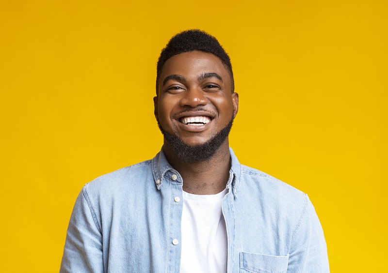 Man with porcelain veneers in Calgary, AB