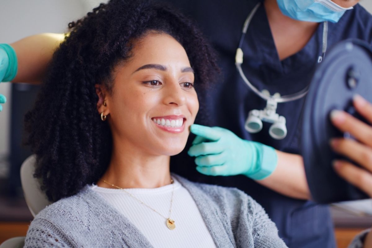 patient reviewing smile makeover results during a cosmetic dentistry consultation
